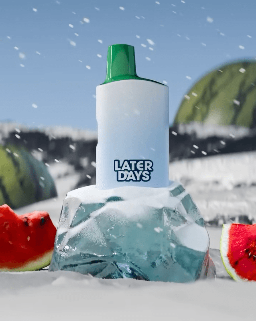 Later Days watermelon flavor vape balanced on a fresh watermelon slice in New Jersey