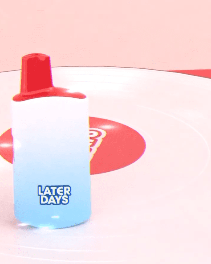 Later Days vape next to a red vinyl record on a turntable in NJ